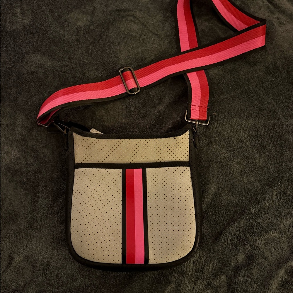 Stylish Beige Crossbody Bag with Red/Pink Strap